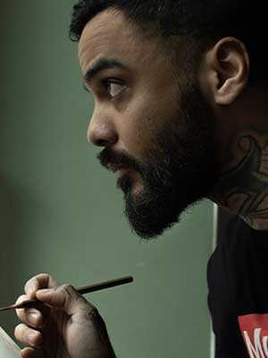 Portrait de Bryan Ly tatoueur à Genève